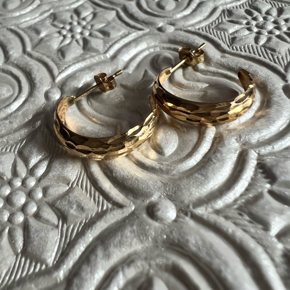 14k gold hoops.